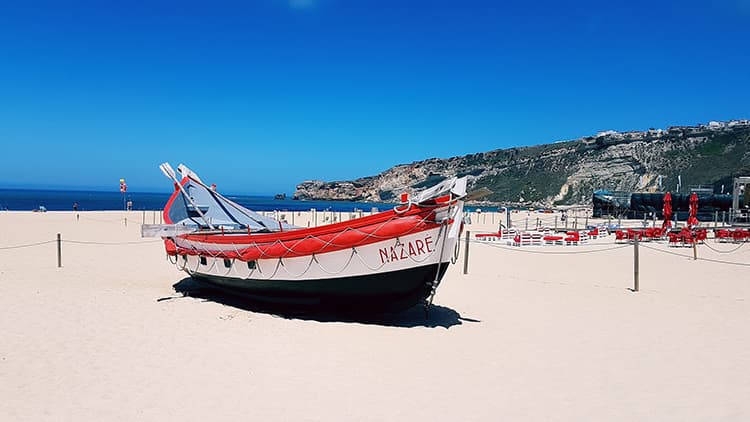 Nazare beach boat Portugal
