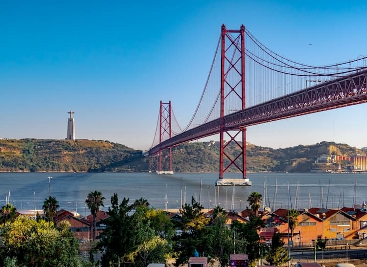 Lisbon Attractions: Cristo Rei sits near the 25 de Abril bridge.